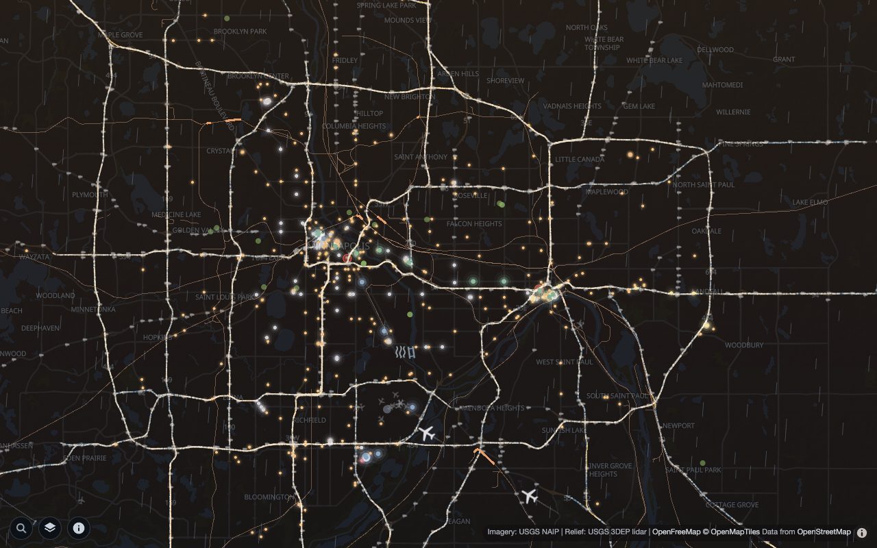 Minneapolis From Above at night: glowing freeways, light rail and transit across the Twin Cities